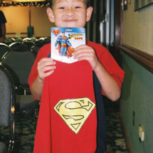 A proud Oscar Spangler and his new Superman cape.