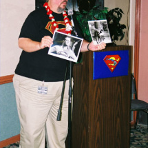 Film historian John Field asks the audience trivia questions and awards the correct answers with photos of George Reeves as Superman!