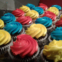 Yummy red, blue, and yellow cupcakes to celebrate our 18th anniversary.
